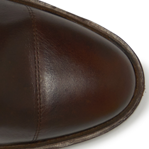 Closeup of Hand-burnished toecap