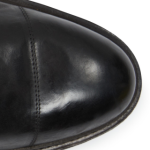 Closeup of Hand-burnished toecap