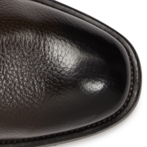 Closeup of Hand-burnished toecap