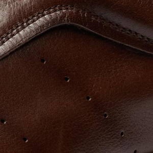 Closeup of Hand antiqued calf leather upper
