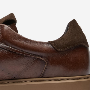 Closeup of Contrast suede heel & tongue