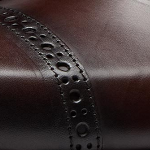 Closeup of Hand antiqued calf leather upper
