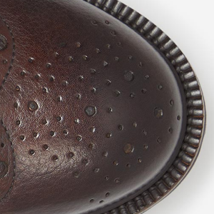 Closeup of Hand-burnished toe & heel