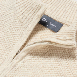 Closeup of Polished metal quarter zip