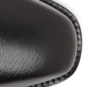 Closeup of Hand-burnished toe