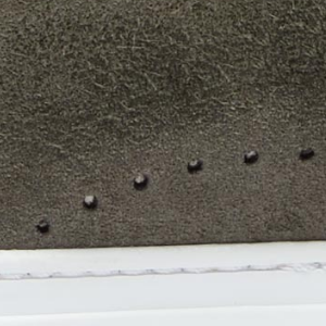 Closeup of Perforated suede detail