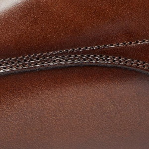 Closeup of Antiqued calf leather upper