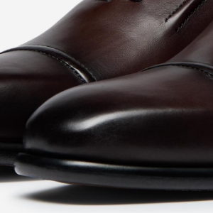 Closeup of Hand-burnished toe, quarter & heel