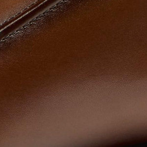 Closeup of Antiqued calf leather upper