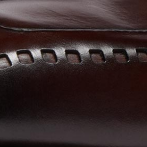 Closeup of Hand antiqued calf leather upper