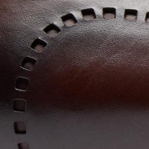 Closeup of Laser-etched square broguing