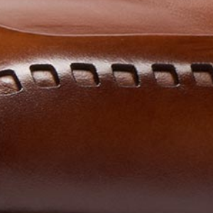 Closeup of Hand antiqued calf leather upper