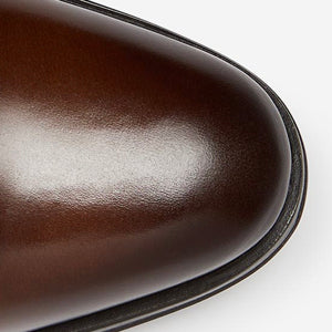 Closeup of Hand-burnished toe cap