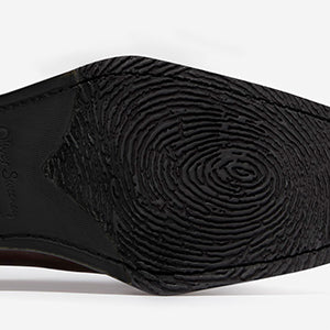 Closeup of Leather sole with rubber forepart