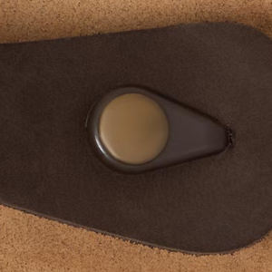 Closeup of Antiqued metal toe post stud