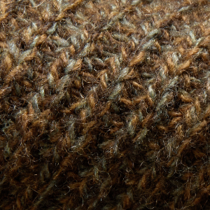Closeup of 5 gauge knit with a melange twist