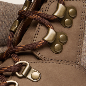 Closeup of Antiqued metal D-rings & ski hooks