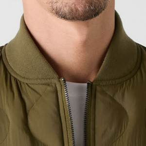 Closeup of Ribbed baseball collar & cuffs