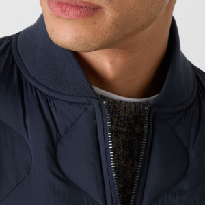 Closeup of Ribbed baseball collar & cuffs
