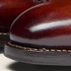 Closeup of Hand-antiqued calf leather upper