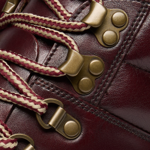 Closeup of Antiqued metal D-rings & ski hooks