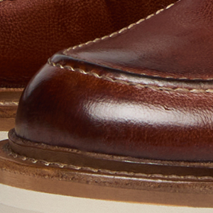 Closeup of Hand-finished calf leather upper
