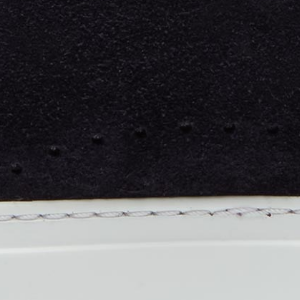 Closeup of Perforated suede detail