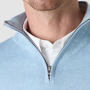 Closeup of Polished metal quarter zip