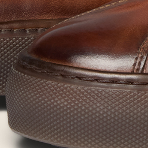 Closeup of Hand-finished calf leather upper