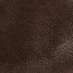 Closeup of Hand-burnished calf suede upper