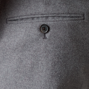 Closeup of 2 rear buttoned pockets