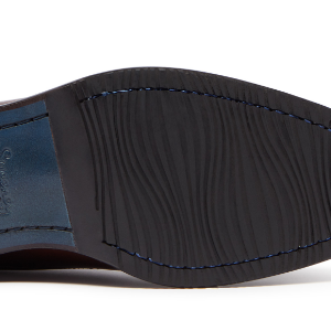 Closeup of Leather sole with rubber forepart