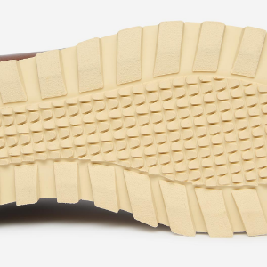 Closeup of Cleated rubber runner sole