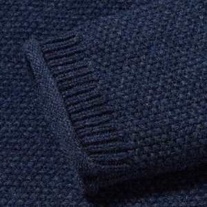 Closeup of Rolled collar, cuffs & hem