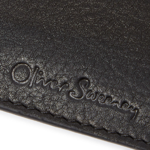 Closeup of Embossed logo and tonal stitching