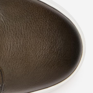 Closeup of Hand-burnished toe