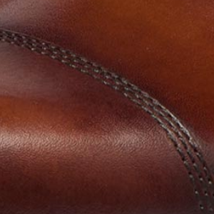 Closeup of Antiqued calf leather upper