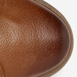Closeup of Hand-burnished toe