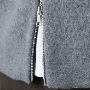 Closeup of Polished metal double zip
