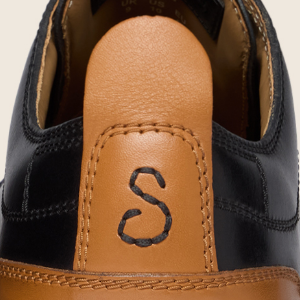 Closeup of Contrast leather heel pull tab