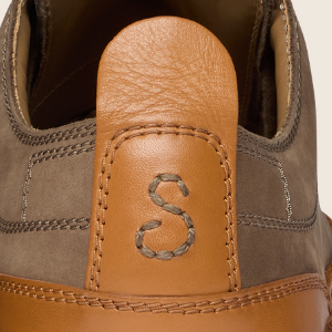 Closeup of Contrast leather heel pull tab