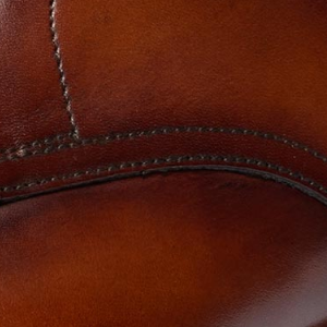 Closeup of Antiqued calf leather upper