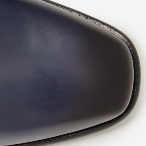 Closeup of Hand-burnished heel, quarter and toe