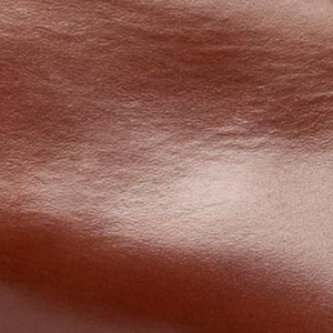 Closeup of Hand-antiqued calf leather upper