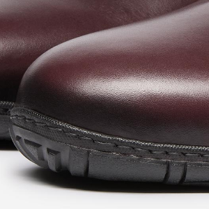 Closeup of Hand antiqued calf leather upper