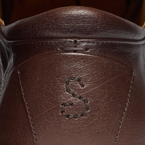 Closeup of Hand-antiqued buffalo leather upper