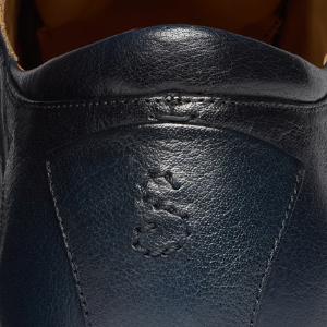 Closeup of Hand-antiqued buffalo leather upper