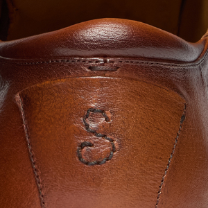 Closeup of Hand-antiqued buffalo leather upper