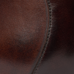 Closeup of Antiqued calf leather upper