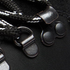 Closeup of Antiqued metal D-rings & ski hooks